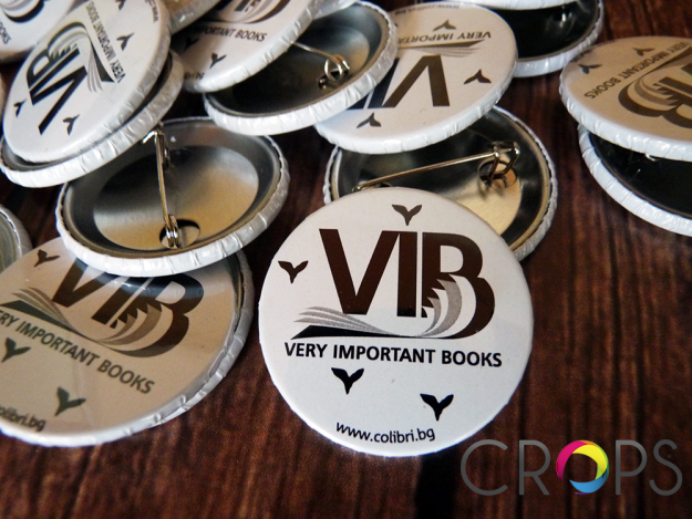 Round badges with a safe needle