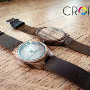 Wooden watch with engraved message, advertising agency